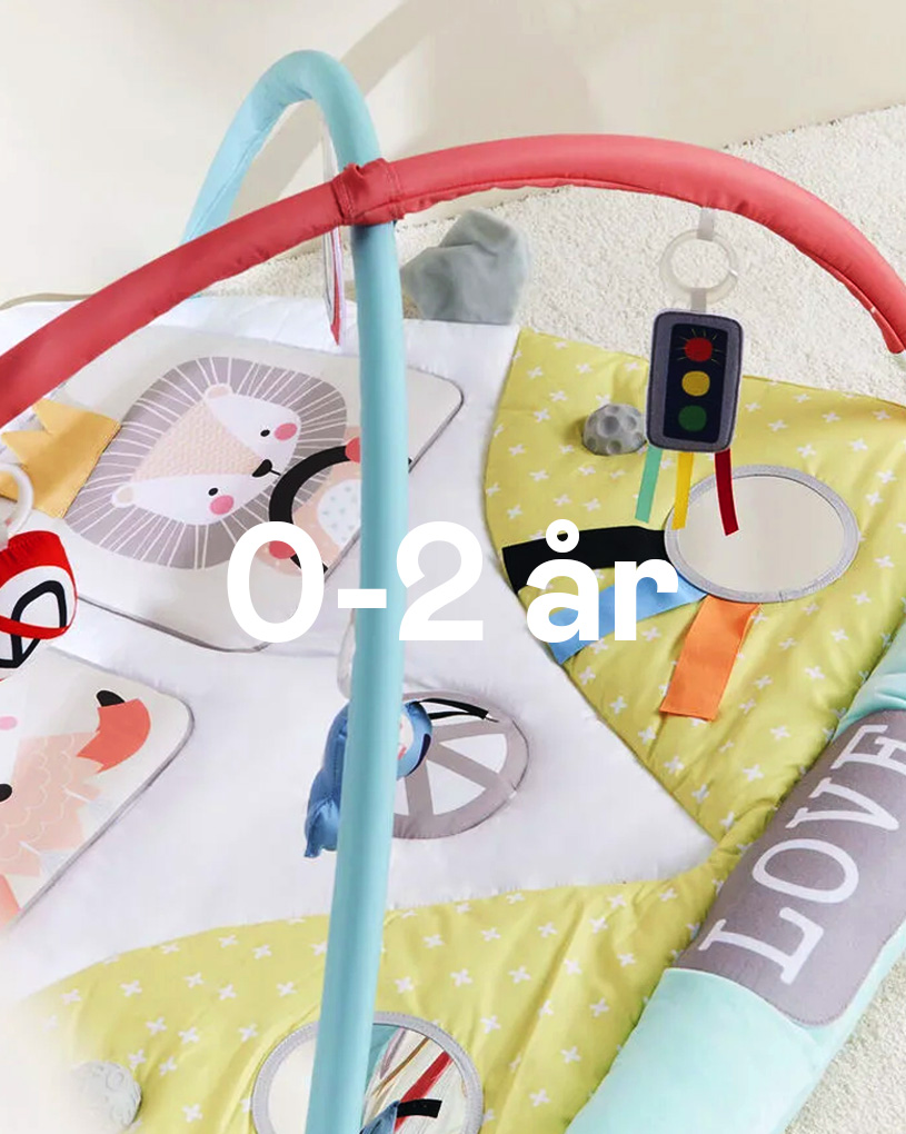 Babygym med färgglada bågar och leksaker, text '0-2 år'.